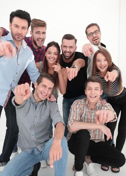 group of successful young men pointing at you.the concept of choice