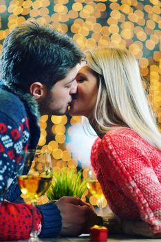 romantic evening date in restaurant  happy young couple with wine glass tea and cake