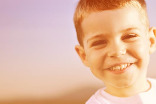 happy young boy child outdoor portrait