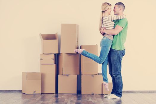 happy Young couple moving in new house