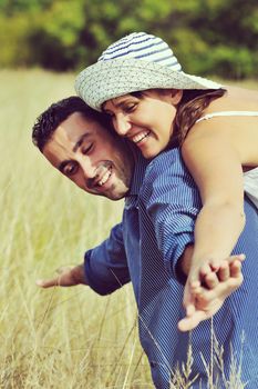 happy young couple have romantic time outdoor while smiling and hug