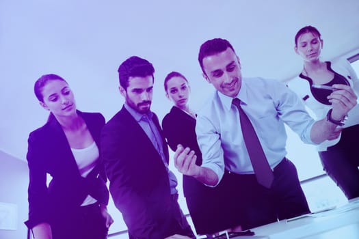 Group of happy young  business people in a meeting at office