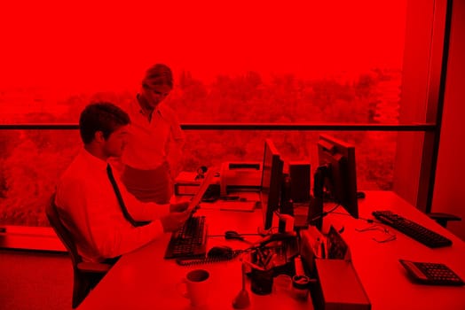 Group of happy young  business people in a meeting at office