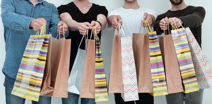 close up.group of students with shopping bags .shopping and lifestyle