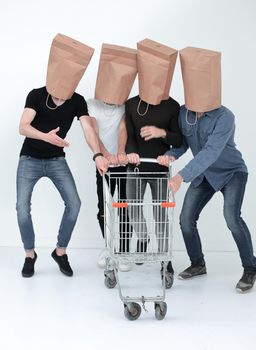 group of people with empty shopping carts. the concept of correct choice