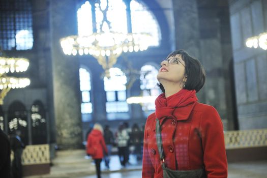 happy young tourist woman travel visit ancient istambul in turkey and old ayasofya blue mosque