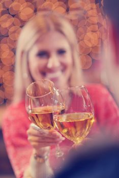 romantic evening date in restaurant  happy young couple with wine glass tea and cake