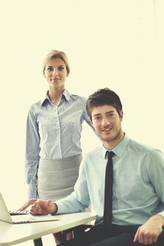 Group of happy young  business people in a meeting at office