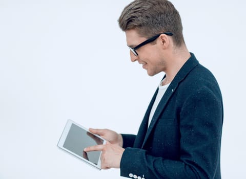 side view.young businessman using digital tablet.isolated on light background