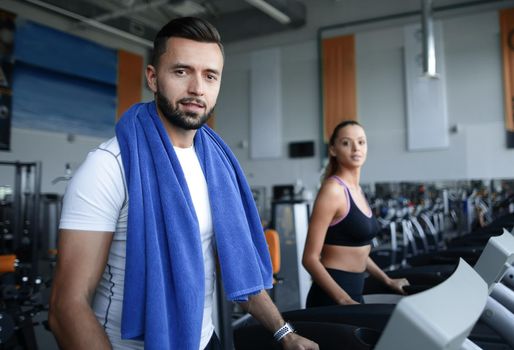 close up. an attractive man works in a modern gym. healthy lifestyle