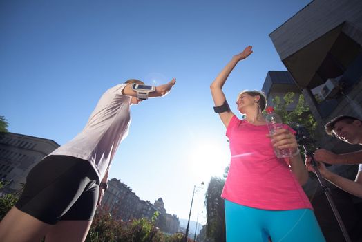 jogging friends couple congratulate and happy to finish their morning workout