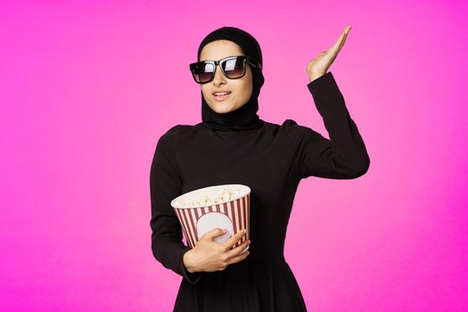 cheerful woman fun popcorn entertainment fashion model ethnicity. High quality photo