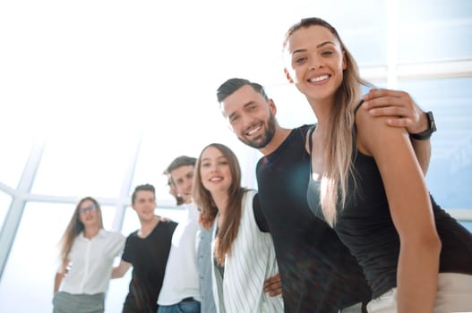 smiling business team standing in the new office.the concept of teamwork