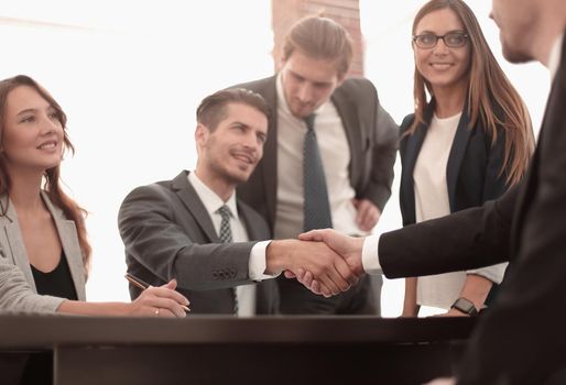 Business colleagues sitting at a table during a meeting