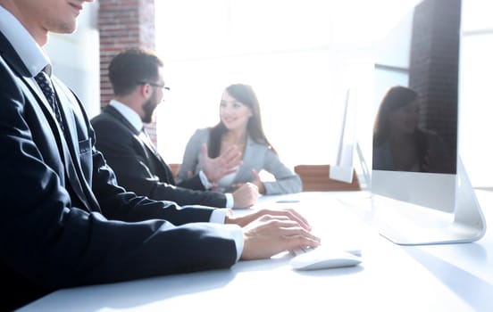 office employees sitting at their work Desk.photo with copy space