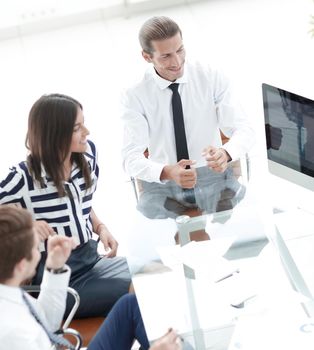 businessman rolls his meeting with the business team. photo with copy space