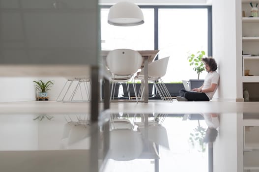 Real man Using laptop on the floor At Home  Enjoying Relaxing