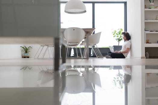 Real man Using laptop on the floor At Home  Enjoying Relaxing