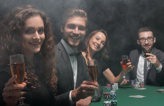 poker players sitting at a table in a casino.photo with copy space.