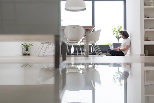 Real man Using laptop on the floor At Home  Enjoying Relaxing