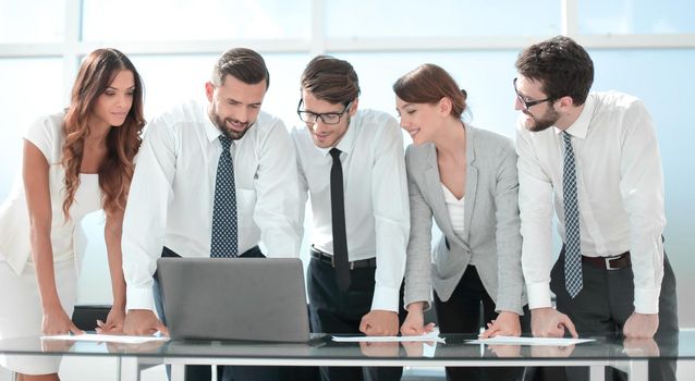business team standing near the desktop.photo with copy space