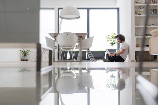 Real man Using laptop on the floor At Home  Enjoying Relaxing