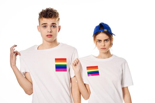 young couple in white t-shirts Flag lgbt transgender sexual minorities. High quality photo