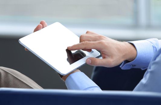 High resolution businessman holding digital tablet