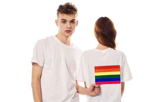 young couple lgbt Flag transgender lifestyle light background. High quality photo