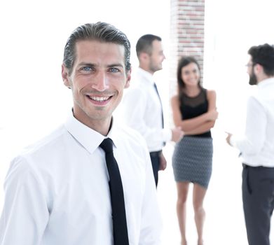 portrait of successful businessman on blurred background.the photo has a blank space for text