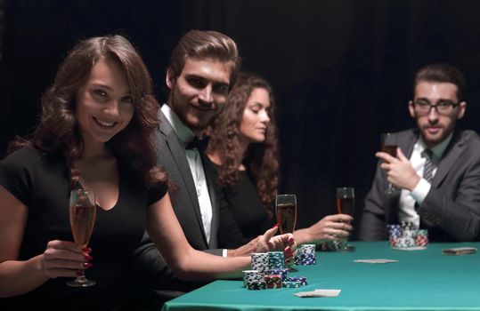 successful young people spend the night at the casino.concept of fortune