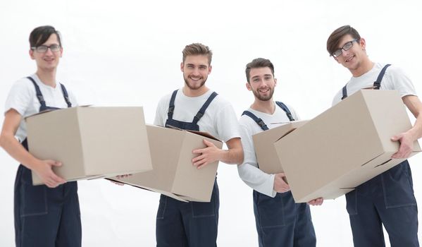 Young movers holding boxes. Delivering and transportation concept.