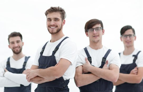 Cheerful team of responsible movers isolated on white background.