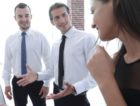 close up of creative business team standing in office