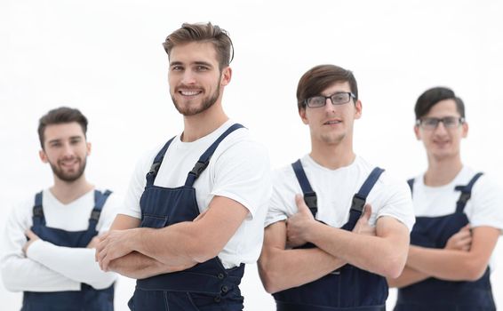 Cheerful team of responsible movers isolated on white background.