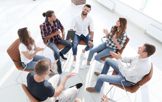 business team holds a meeting in the lobby of the office.the concept of teamwork