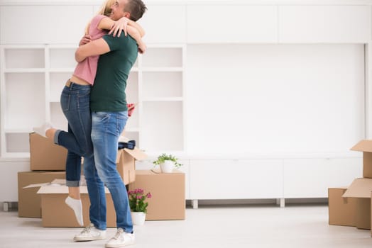 excited happy young couple looking forward to moving into a new home