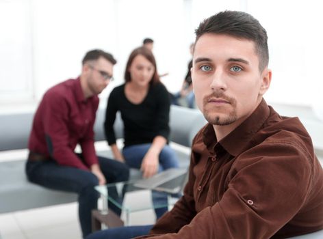 employee on the background of business team in office