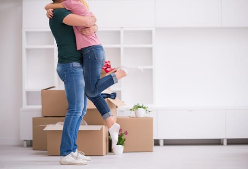 excited happy young couple looking forward to moving into a new home