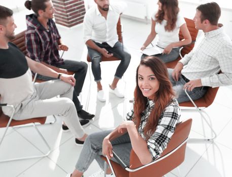 group of young talented employees sitting in the office