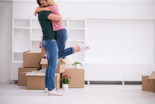 excited happy young couple looking forward to moving into a new home