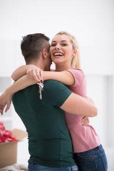 excited happy young couple looking forward to moving into a new home