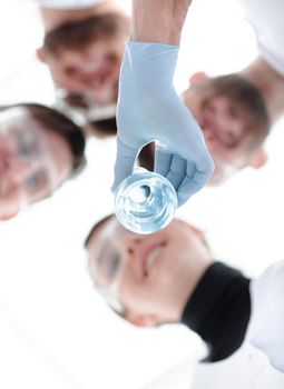 closeup.healthcare professionals working with liquids in laborator