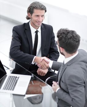 closeup. business handshake in an office.the concept of partnership