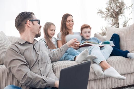 happy family spends their free time in their living room.photo with copy space