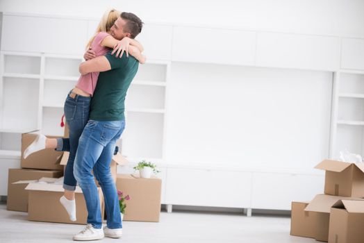 excited happy young couple looking forward to moving into a new home