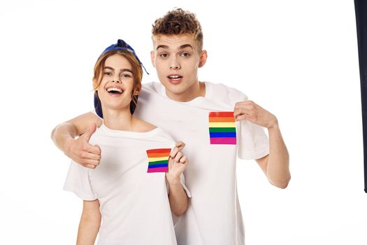 young couple lgbt Flag transgender lifestyle light background. High quality photo