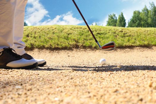 golf shot from sand bunker golfer hitting ball from hazard
