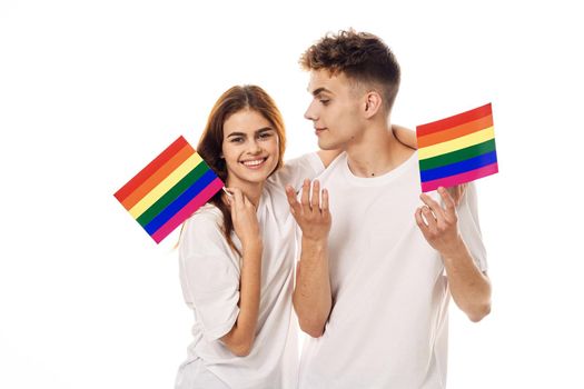 young couple lgbt Flag transgender lifestyle light background. High quality photo