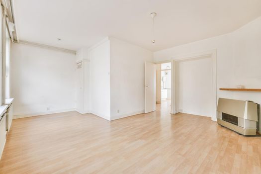 Lovely bright room with an old fireplace